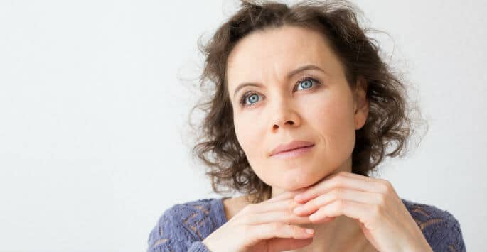 Older woman in deep thought