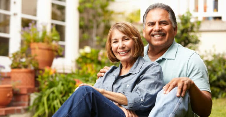 Happy couple relaxing outside